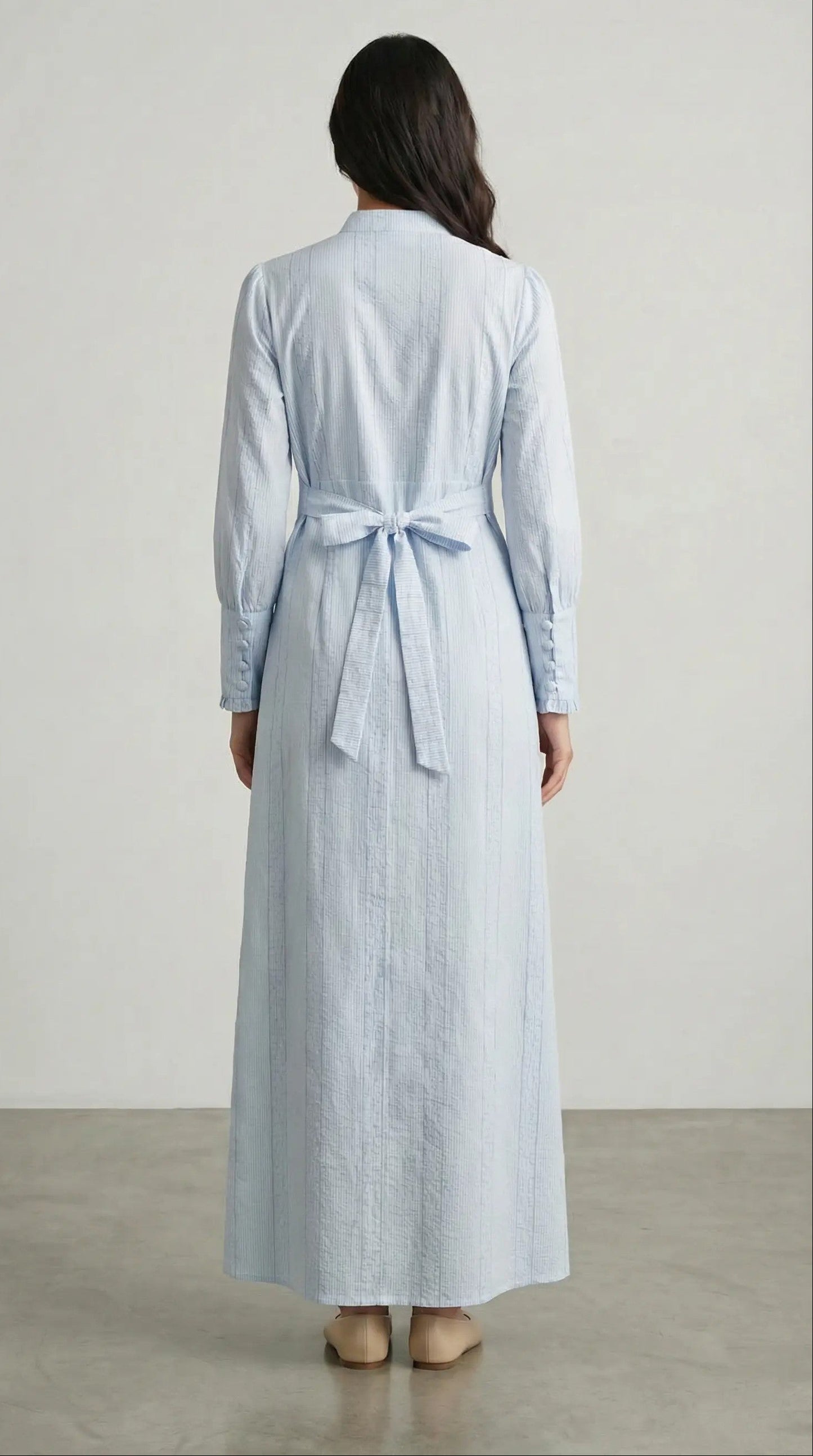 Back view of Blue Horizon blue modest maxi dress with long sleeve