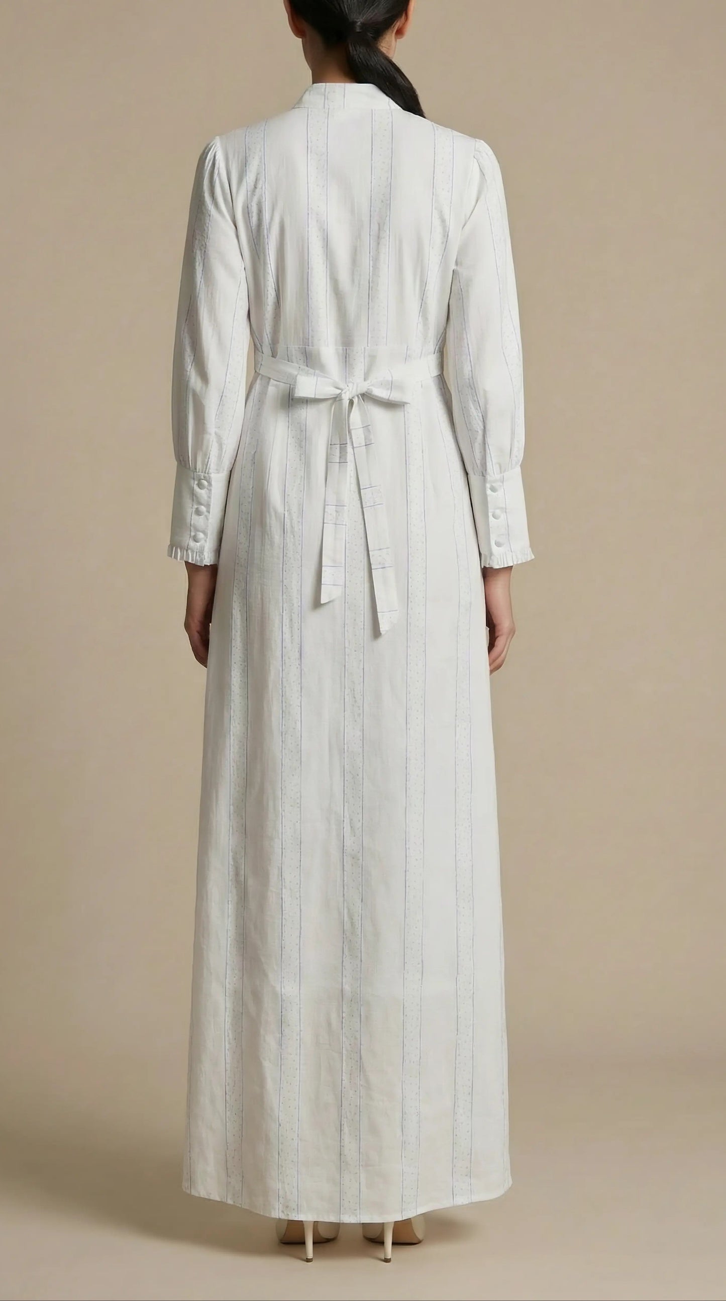 Back view of Pearl Whisper white modest maxi dress with long sleeve