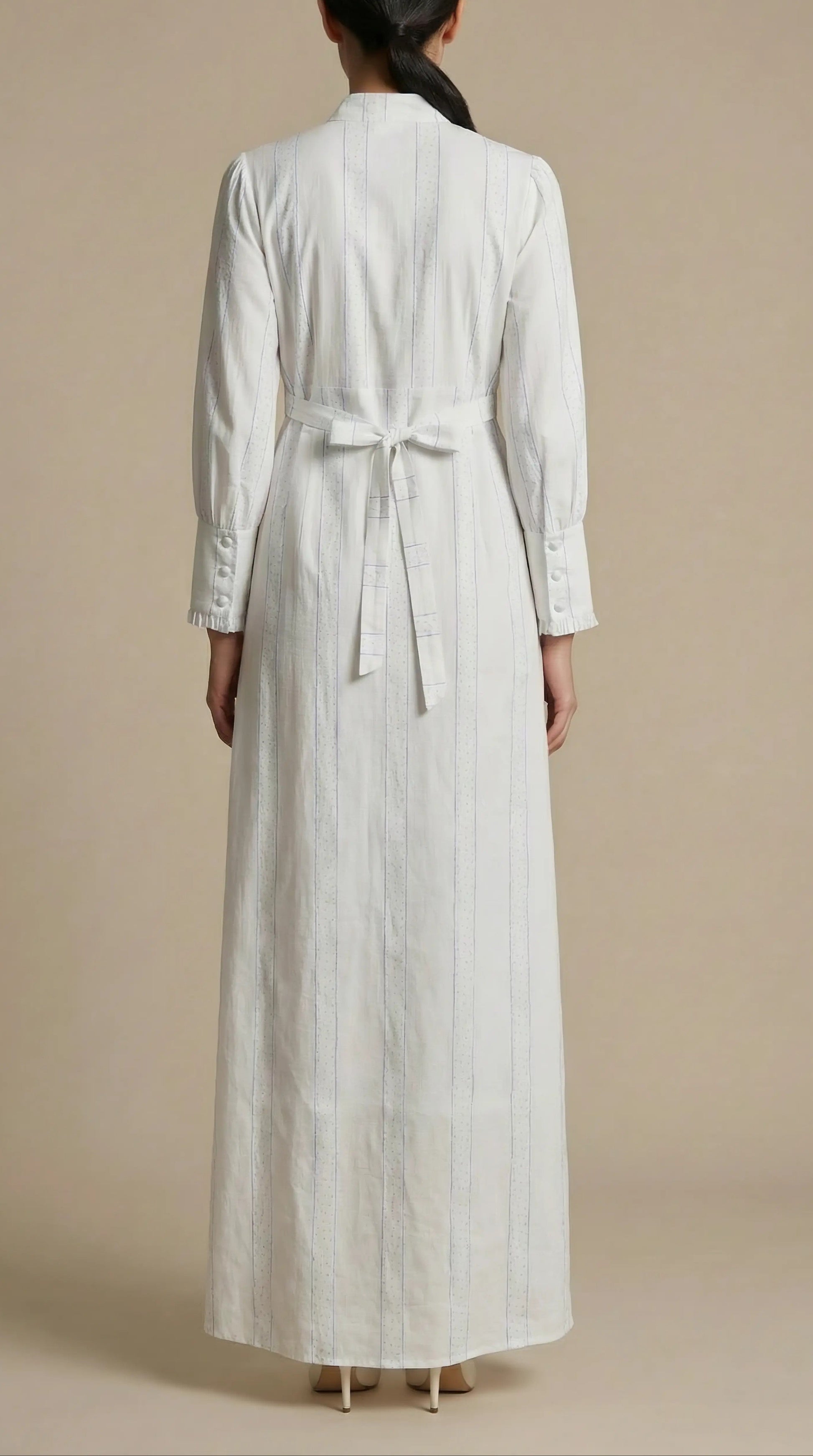 Back view of Pearl Whisper white modest maxi dress with long sleeve
